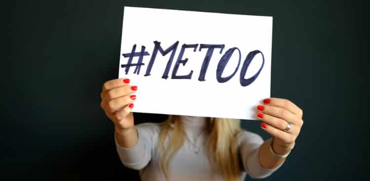 Sexual Assault Survivor Holding MeToo Sign