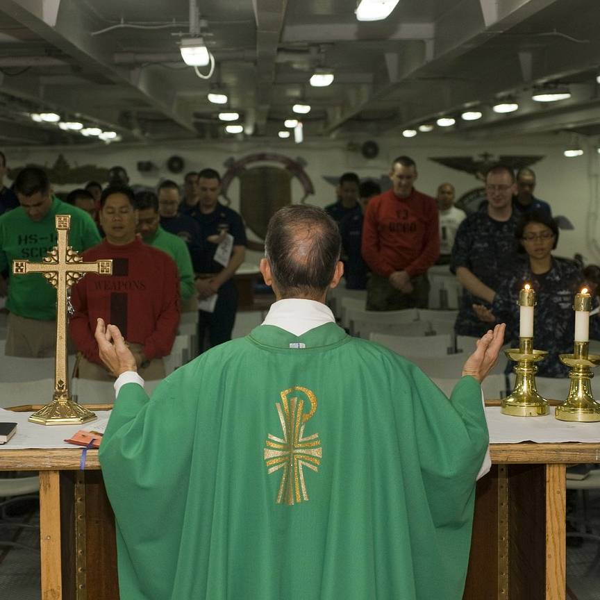 priest saying mass