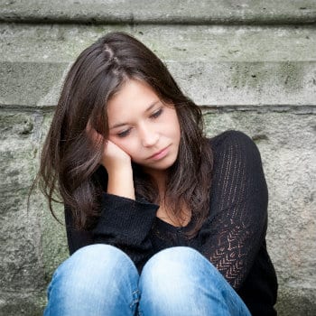 sad young woman in thought